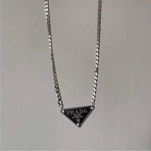 Prada Silver and Black Triangle Necklace